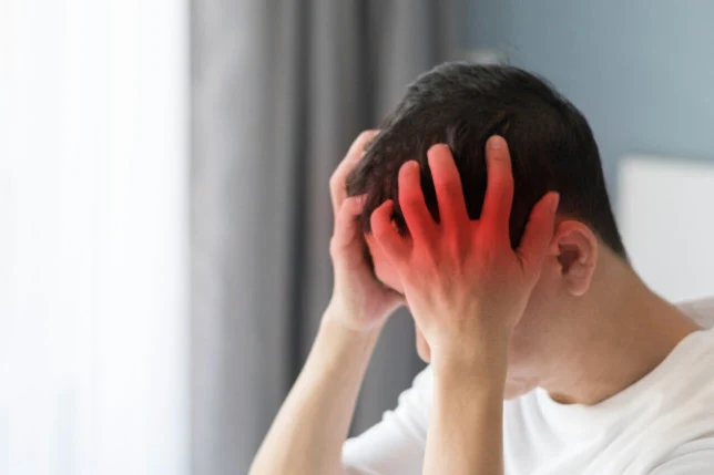 Men experiencing severe headache